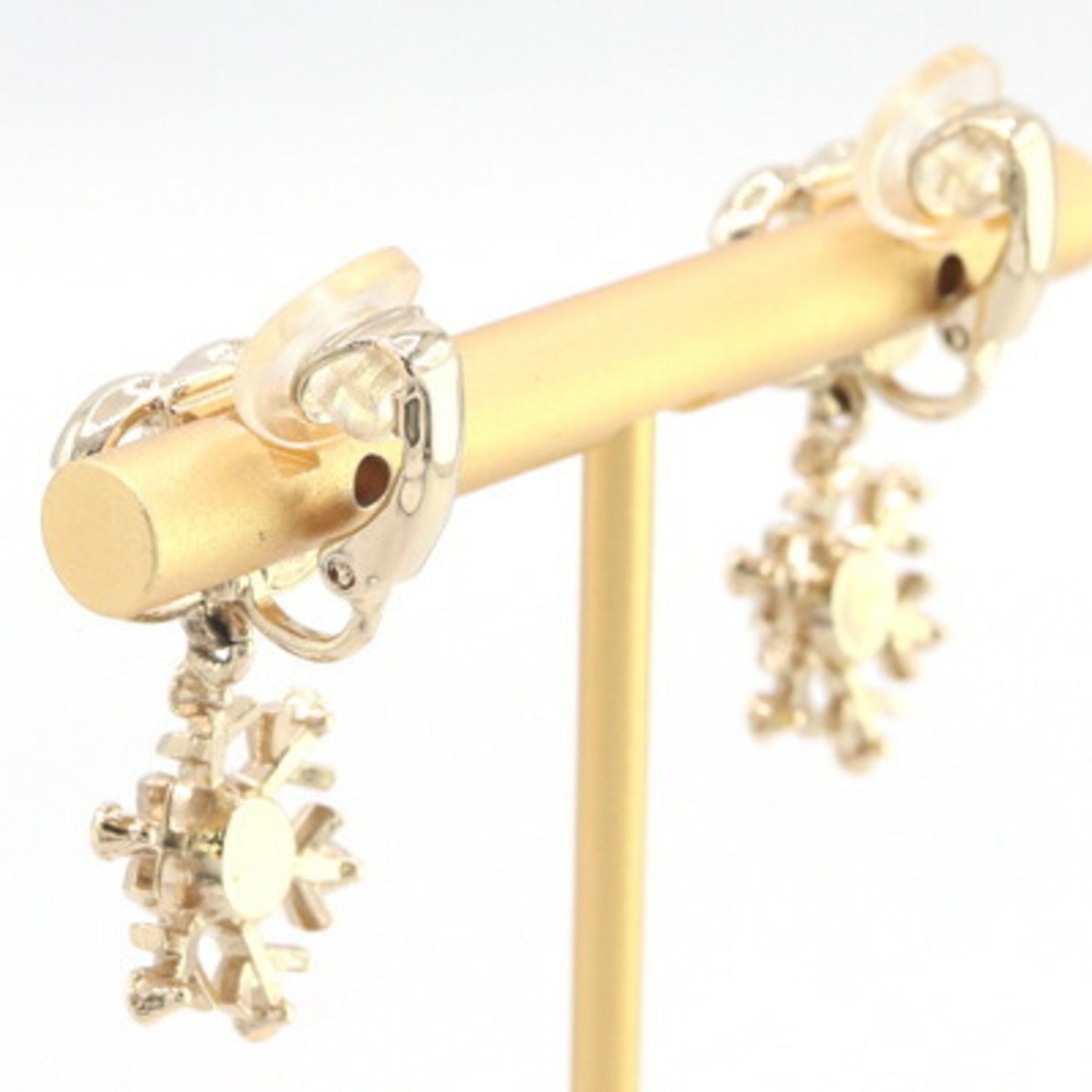 CHANEL Coco Mark Snowflake Earrings in Matte Gold Metal with Rhinestones, 2019 Model, Design