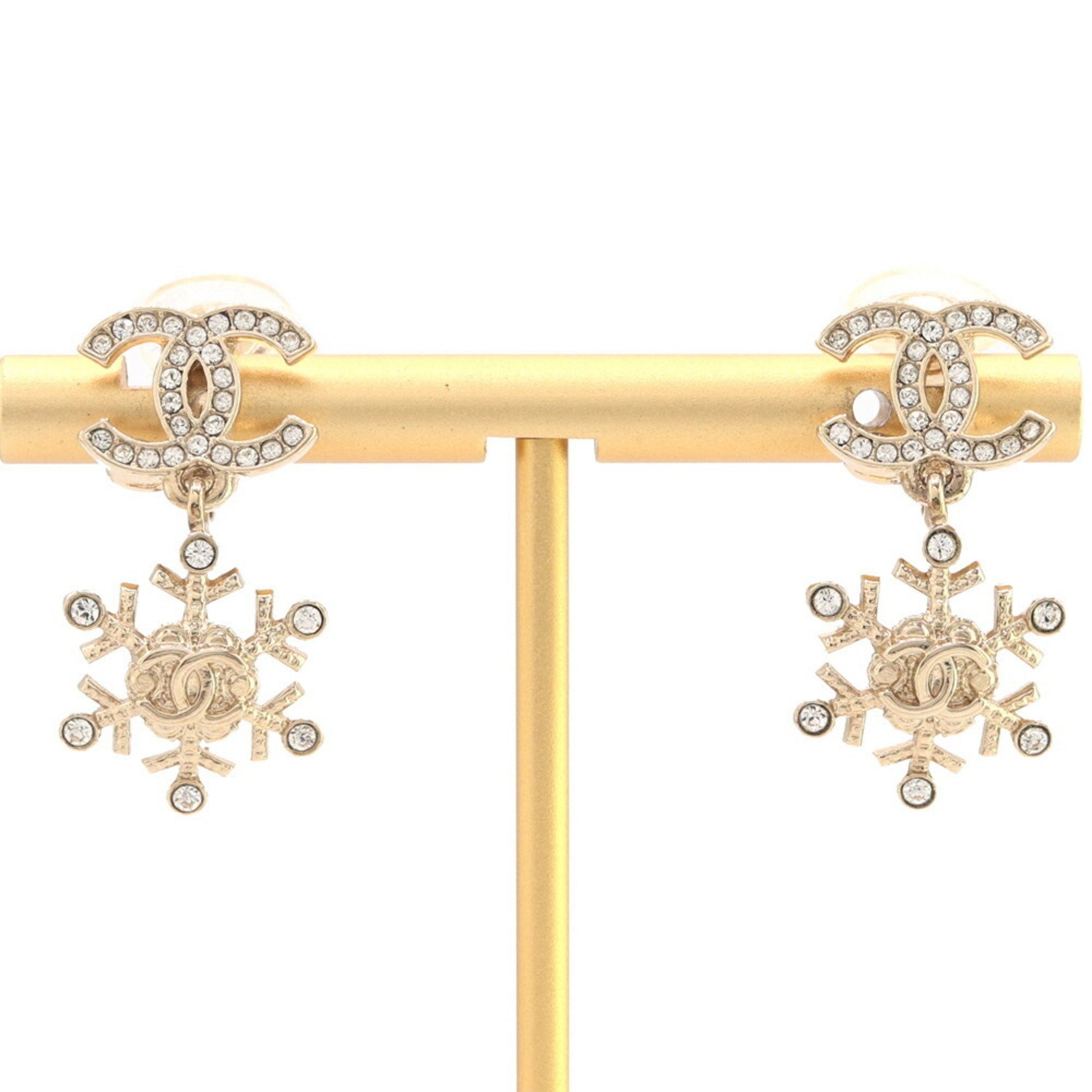 CHANEL Coco Mark Snowflake Earrings in Matte Gold Metal with Rhinestones, 2019 Model, Design