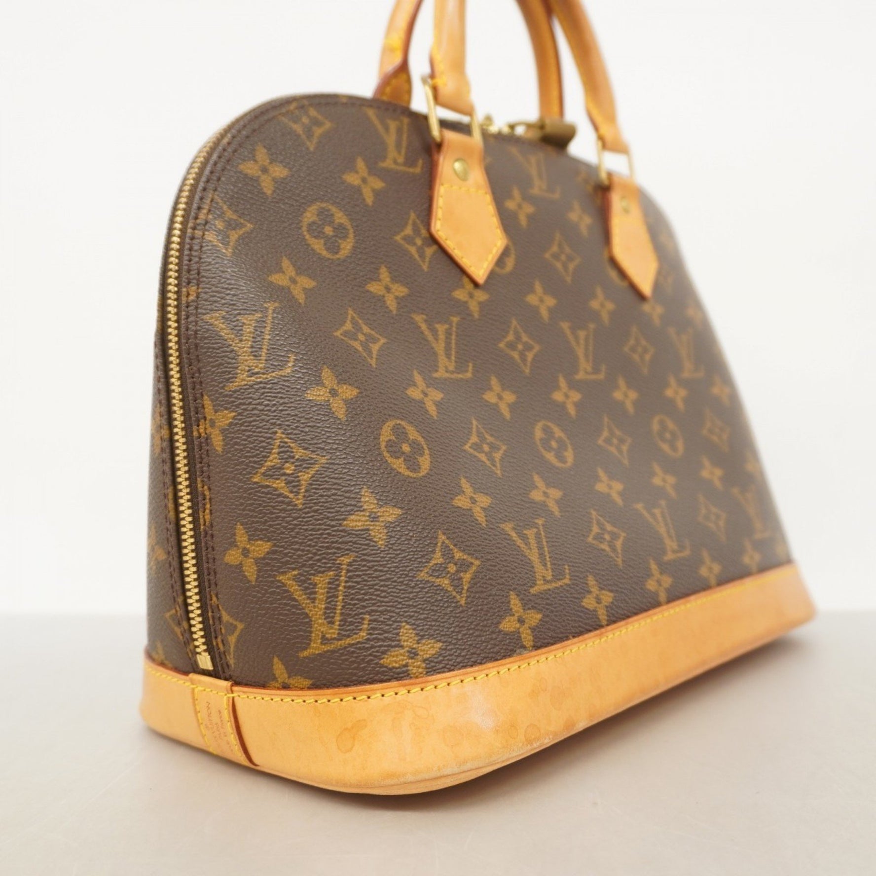 Louis Vuitton Monogram Alma Handbag
