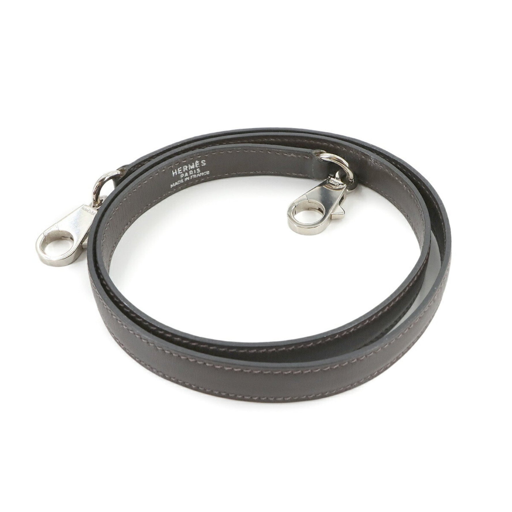 Hermes Hermès Kelly Bolide shoulder strap in box calf leather with silver hardware.