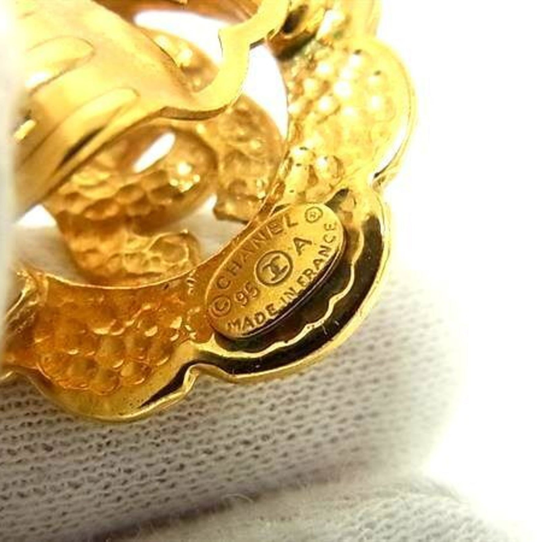 CHANEL Coco Mark Metal Earrings