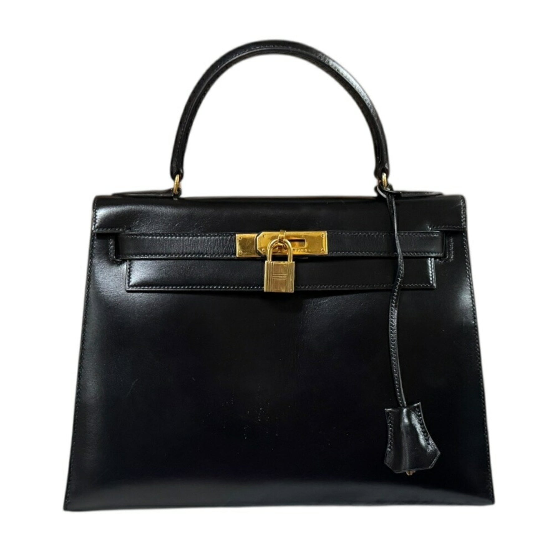 Hermès Kelly 28 handbag in box calf leather with external stitching. HERMES