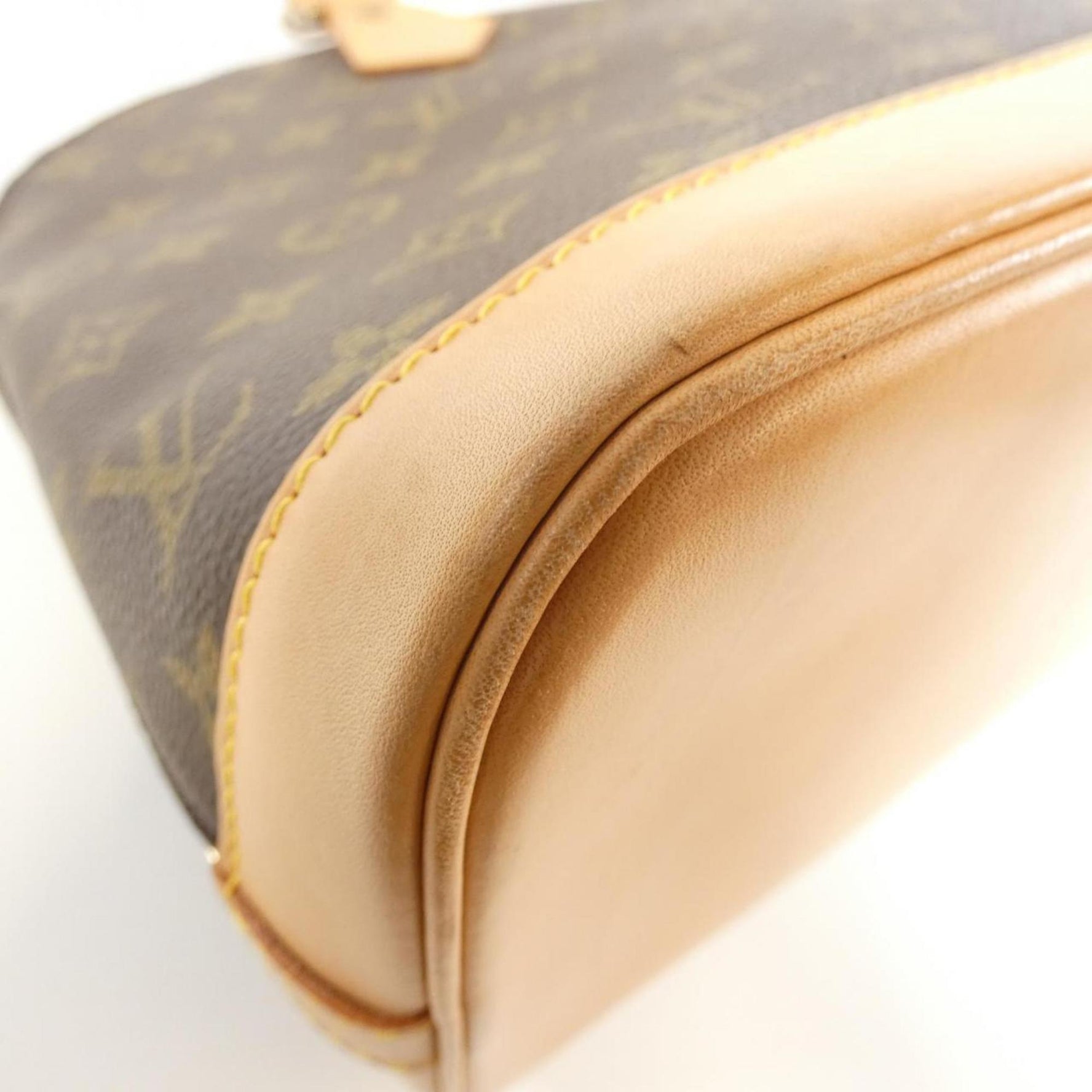 Louis Vuitton Monogram Alma PM Handbag