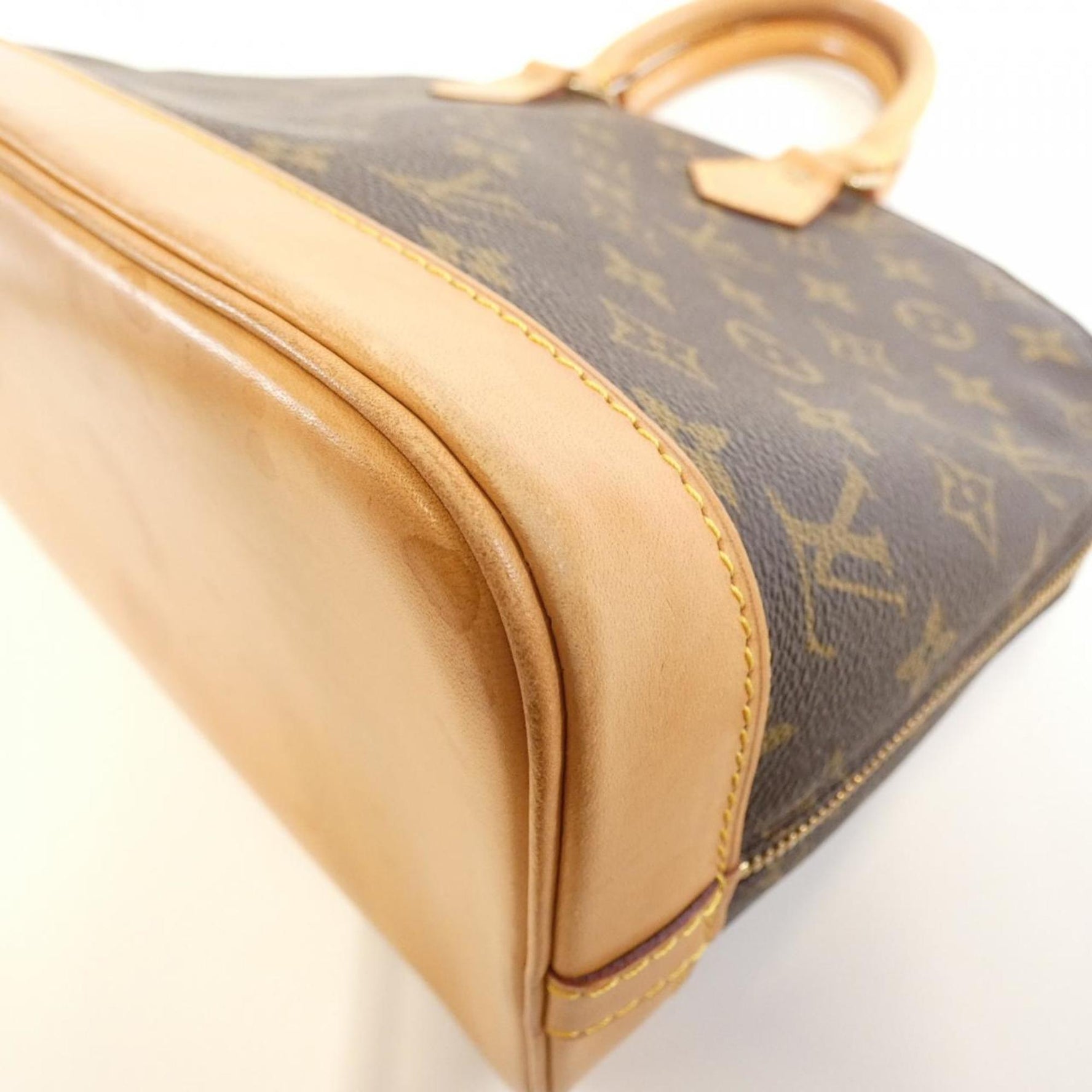 Louis Vuitton Monogram Alma PM Handbag