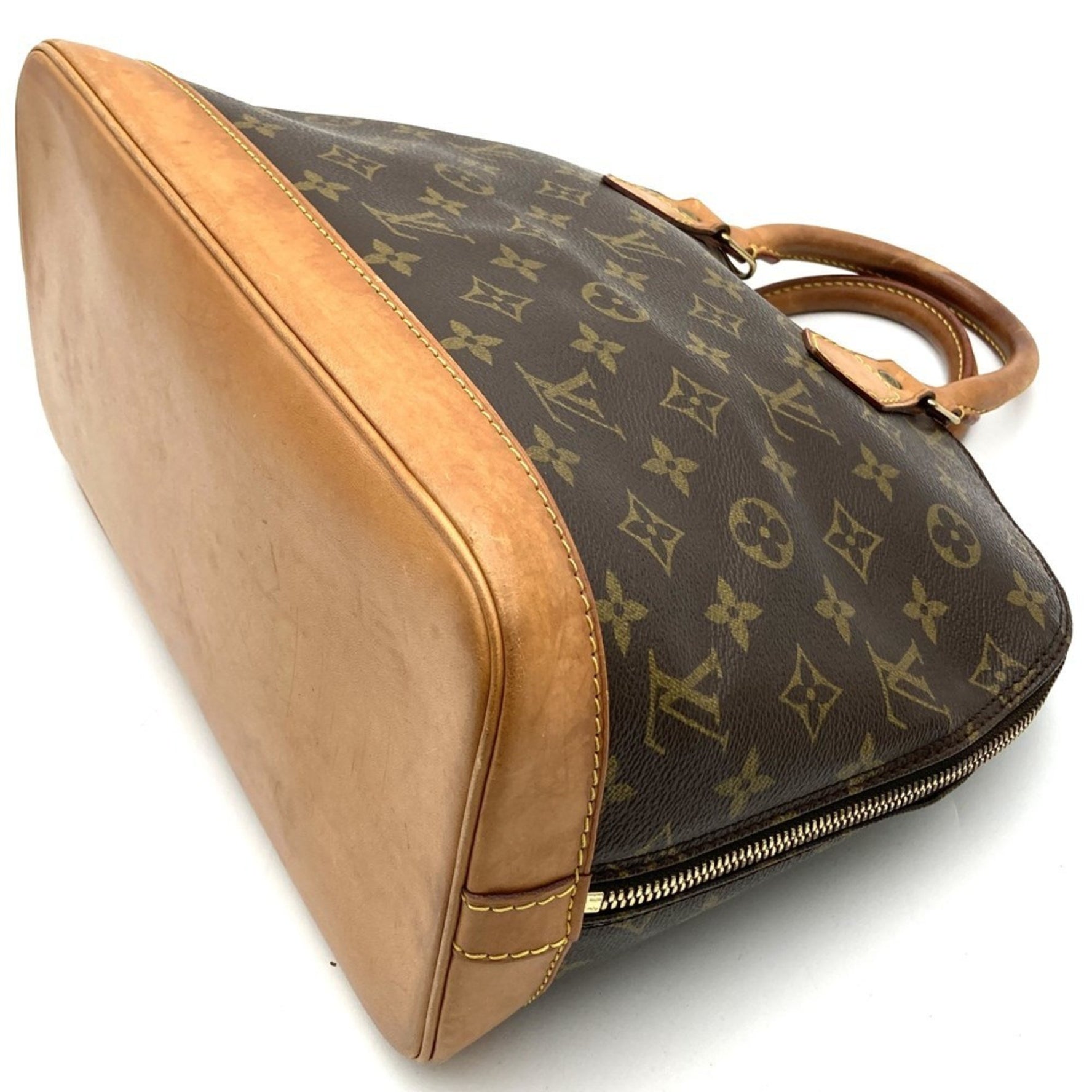 Louis Vuitton Alma (old) handbag, monogram canvas, and men