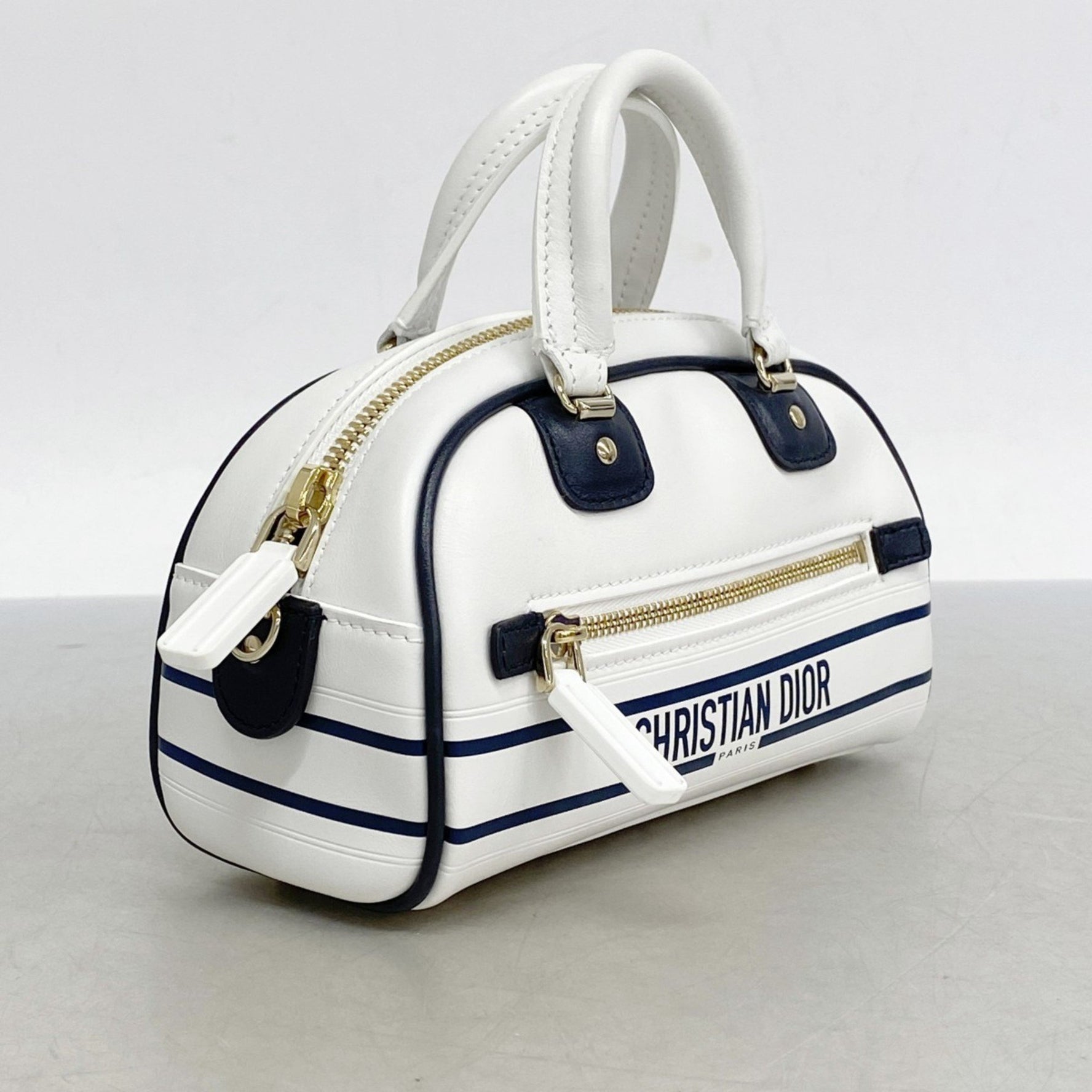 Christian Dior Vibe Mini Leather Handbag in White, Navy, and Champagne. Bag .