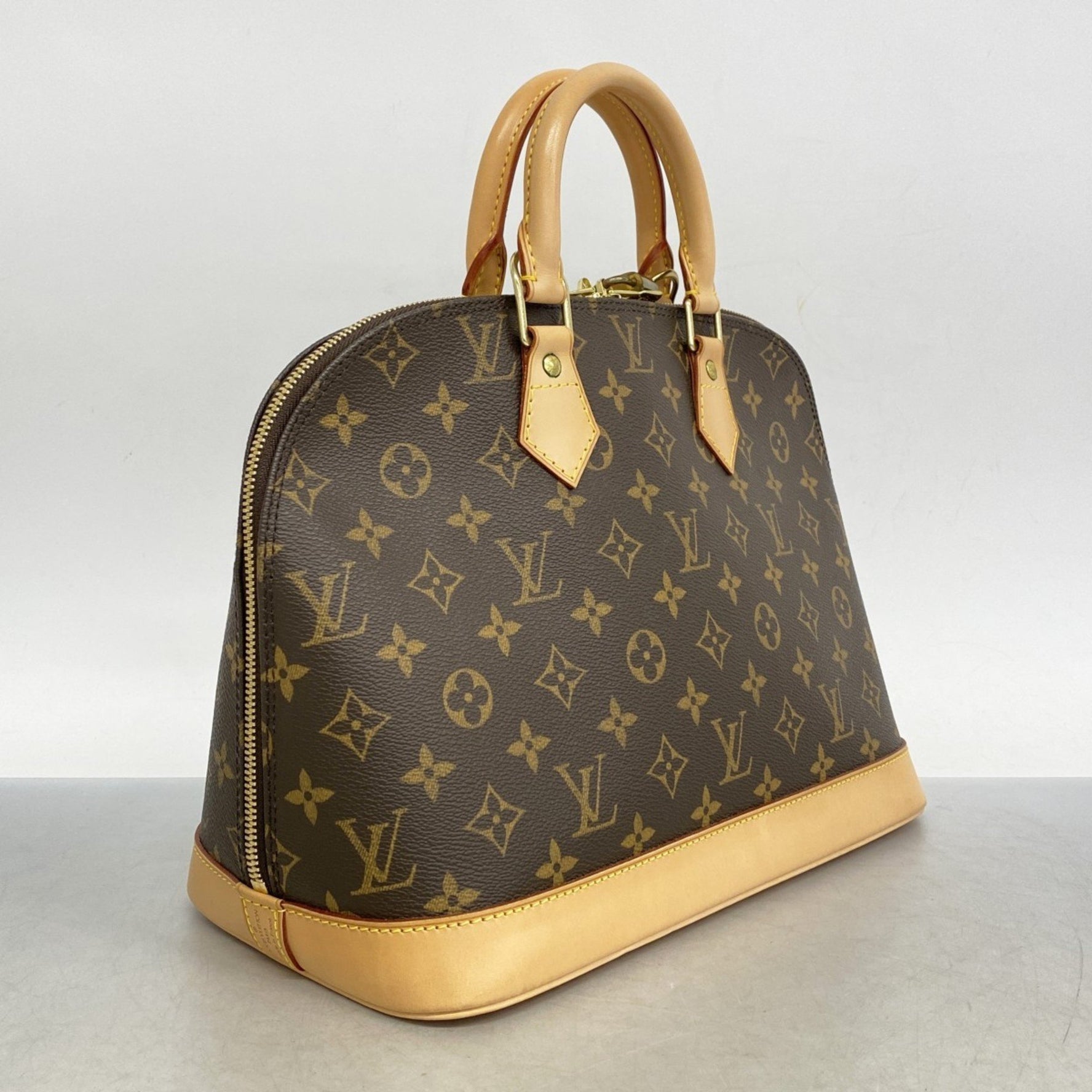 Louis Vuitton Monogram Alma Handbag