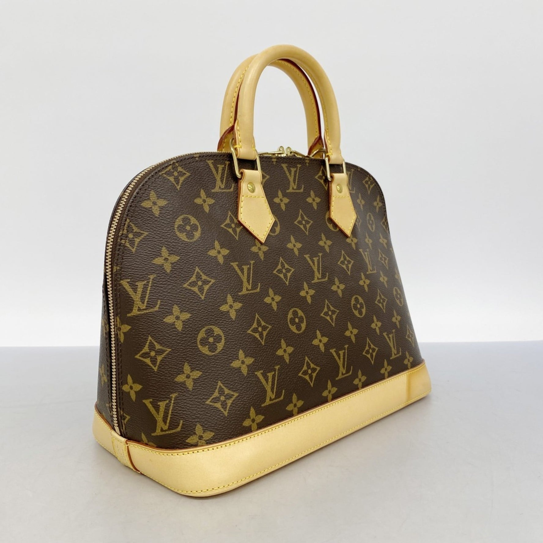 Louis Vuitton Monogram Alma Handbag