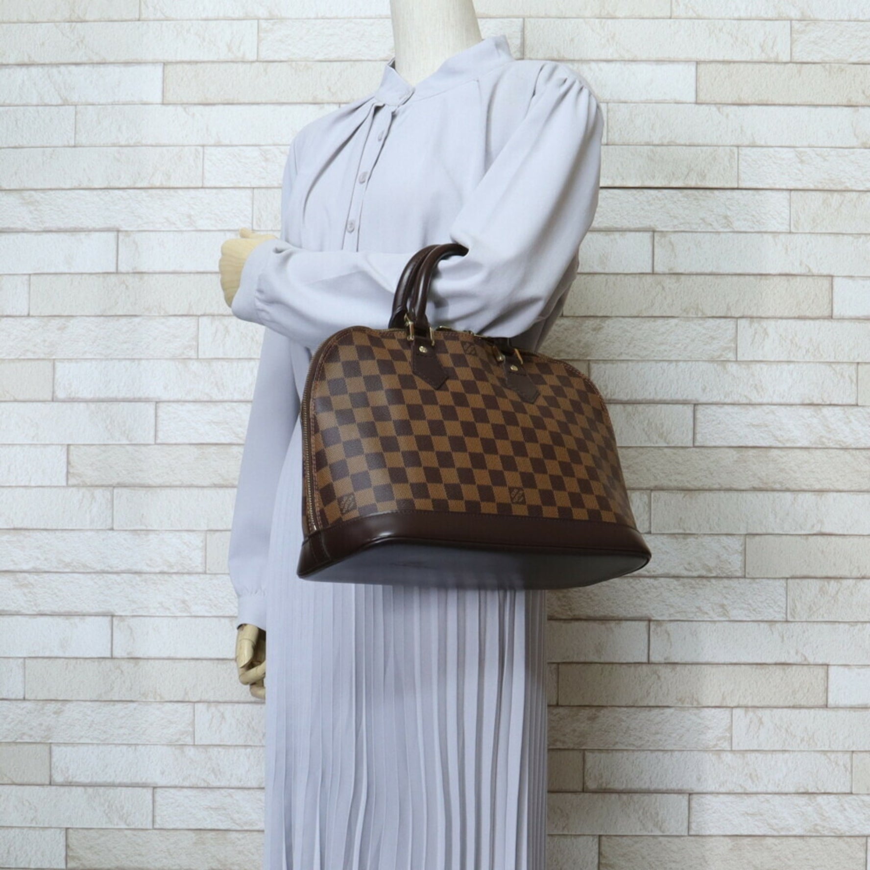 Louis Vuitton Alma Damier Handbag Canvas