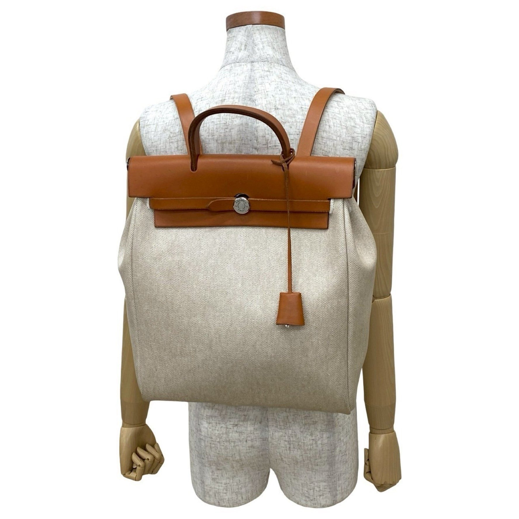 HERMES Airbag Ad PM Toile Officier Leather Backpack in Brown and Ivory