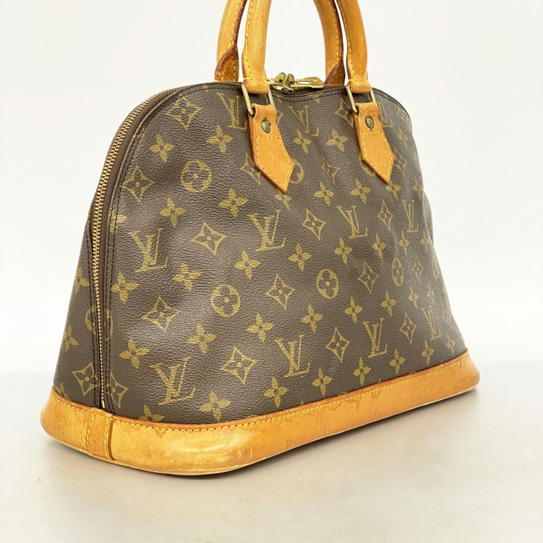 Louis Vuitton Monogram Alma Handbag