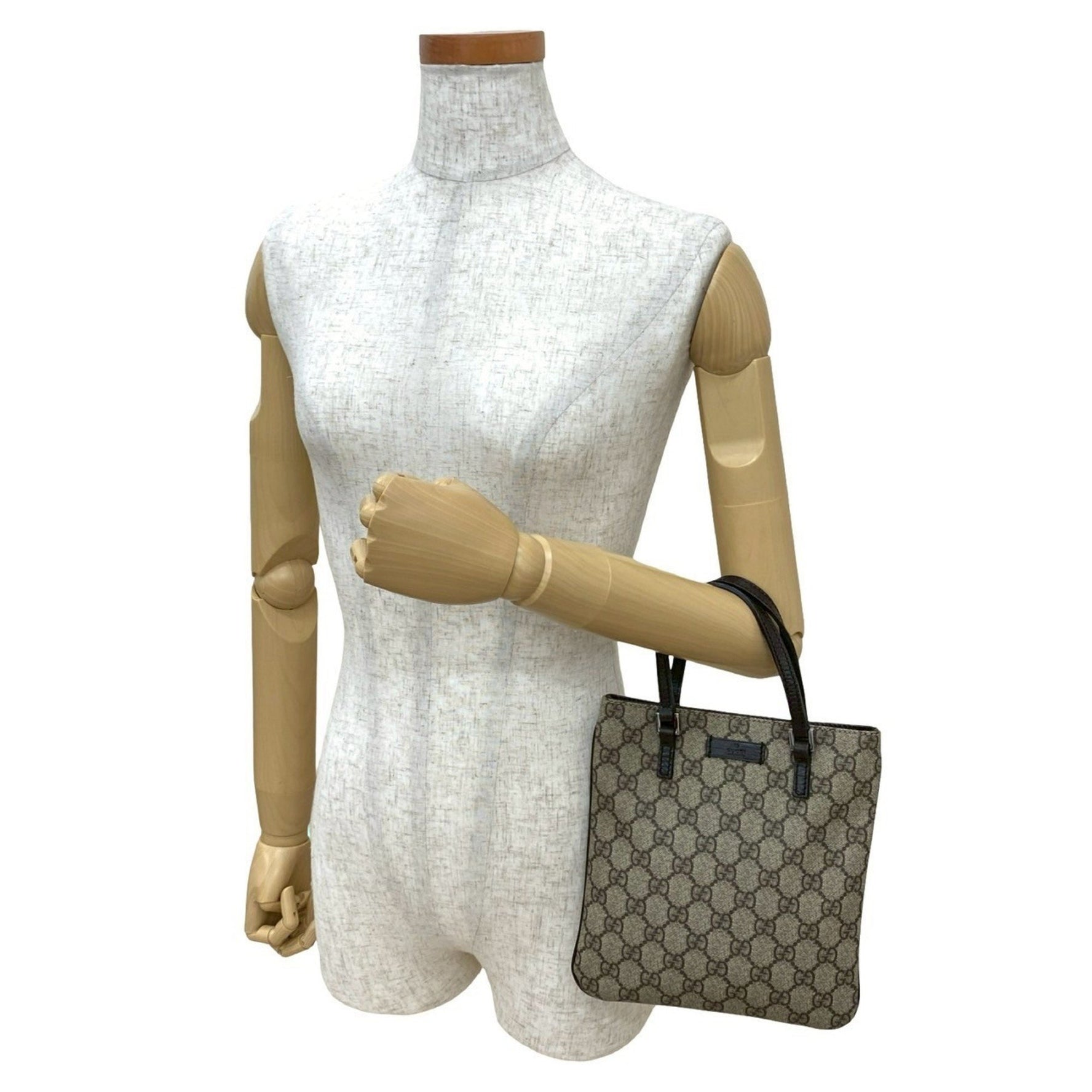 GUCCI GG Supreme logo embossed leather handbag/mini tote bag in and beige