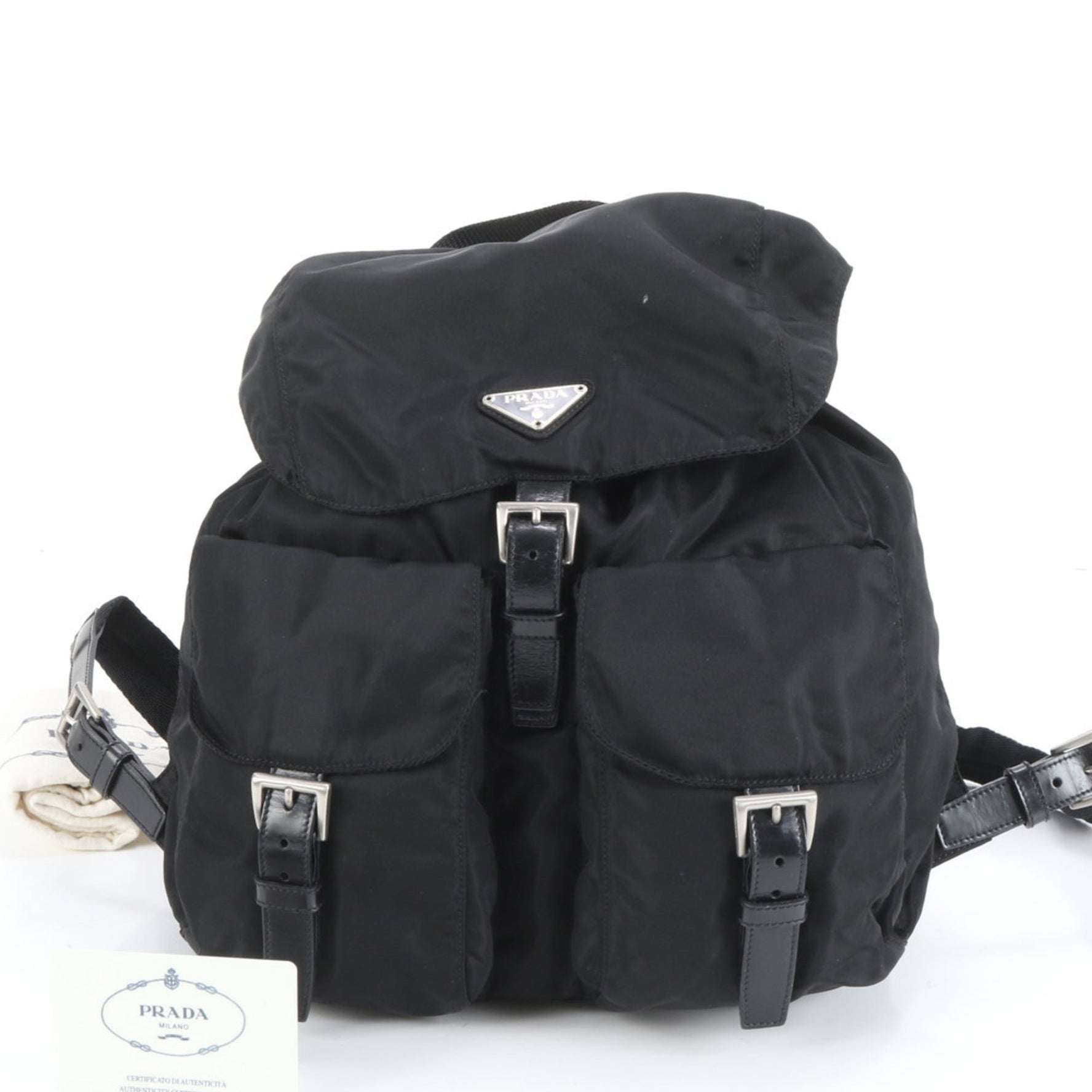 Prada Tessuto nylon and leather backpack with triangle logo includes guarantee card.