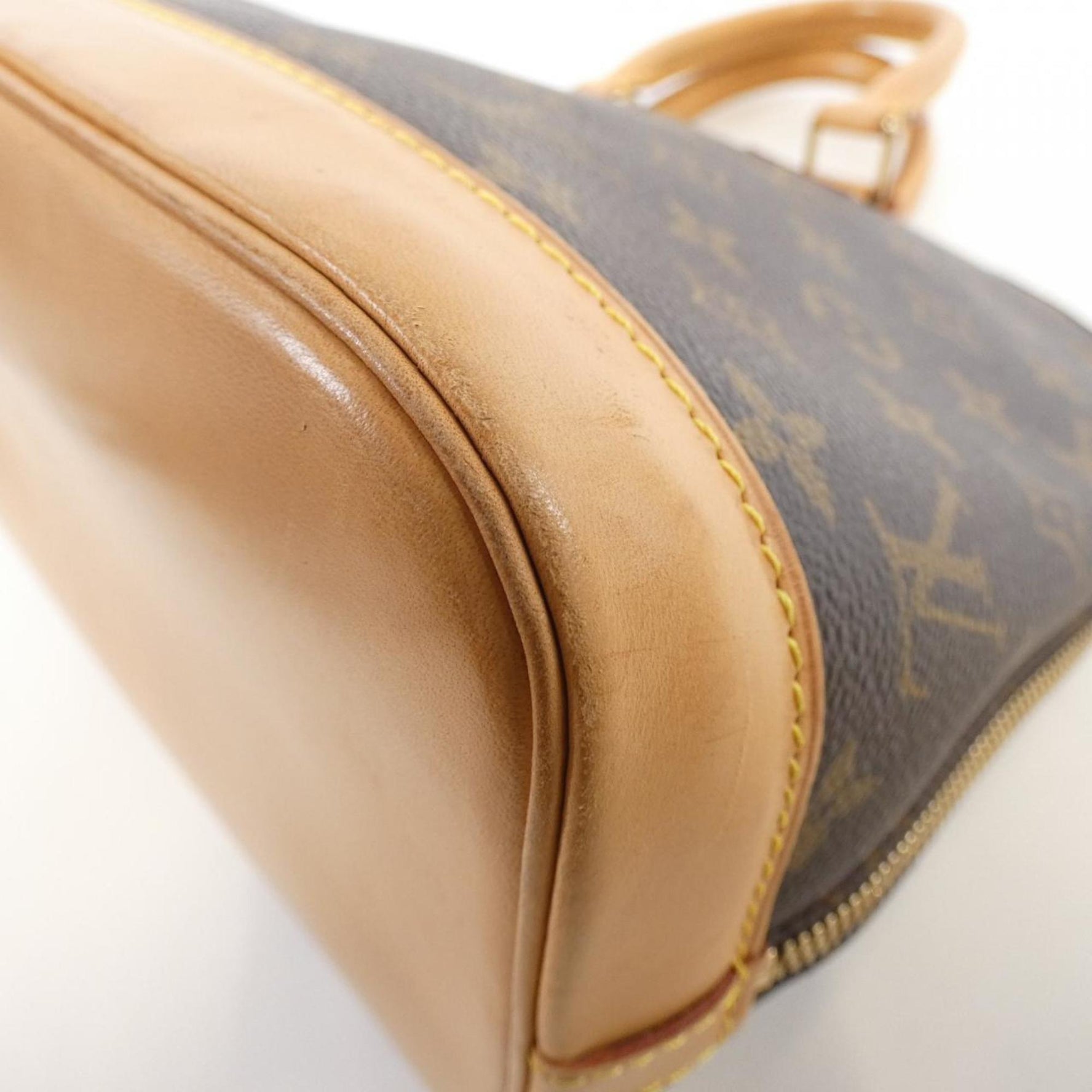 Louis Vuitton Monogram Alma PM Handbag
