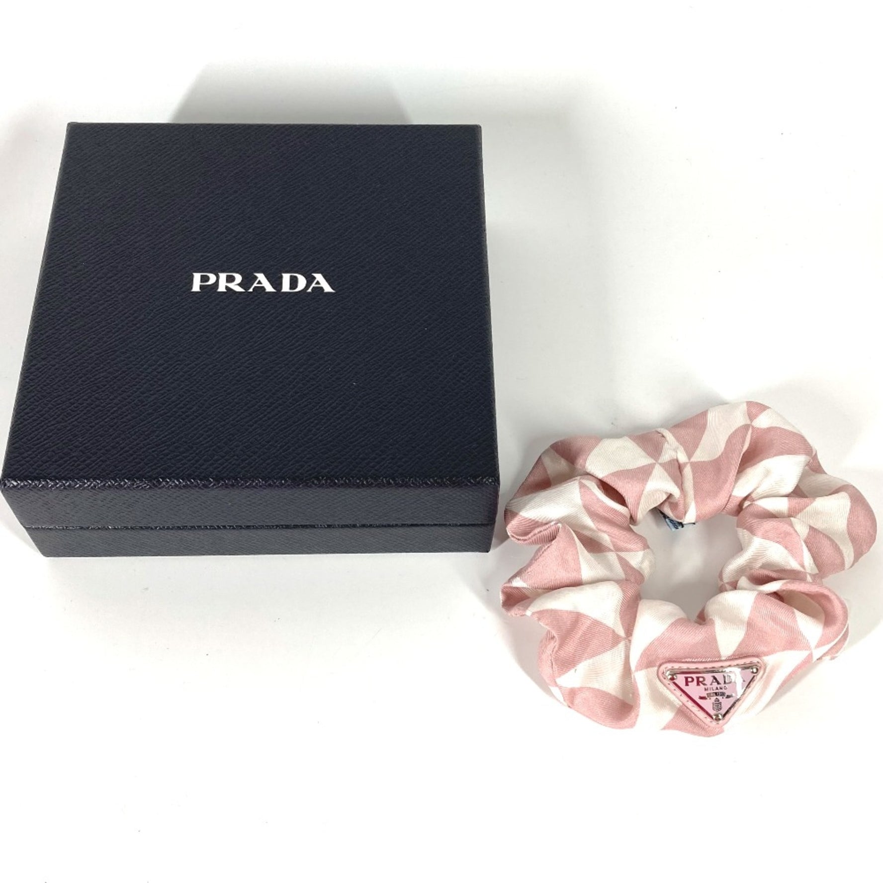 PRADA triangle logo triangle logo plate hair accessories hair rubber Shush White
