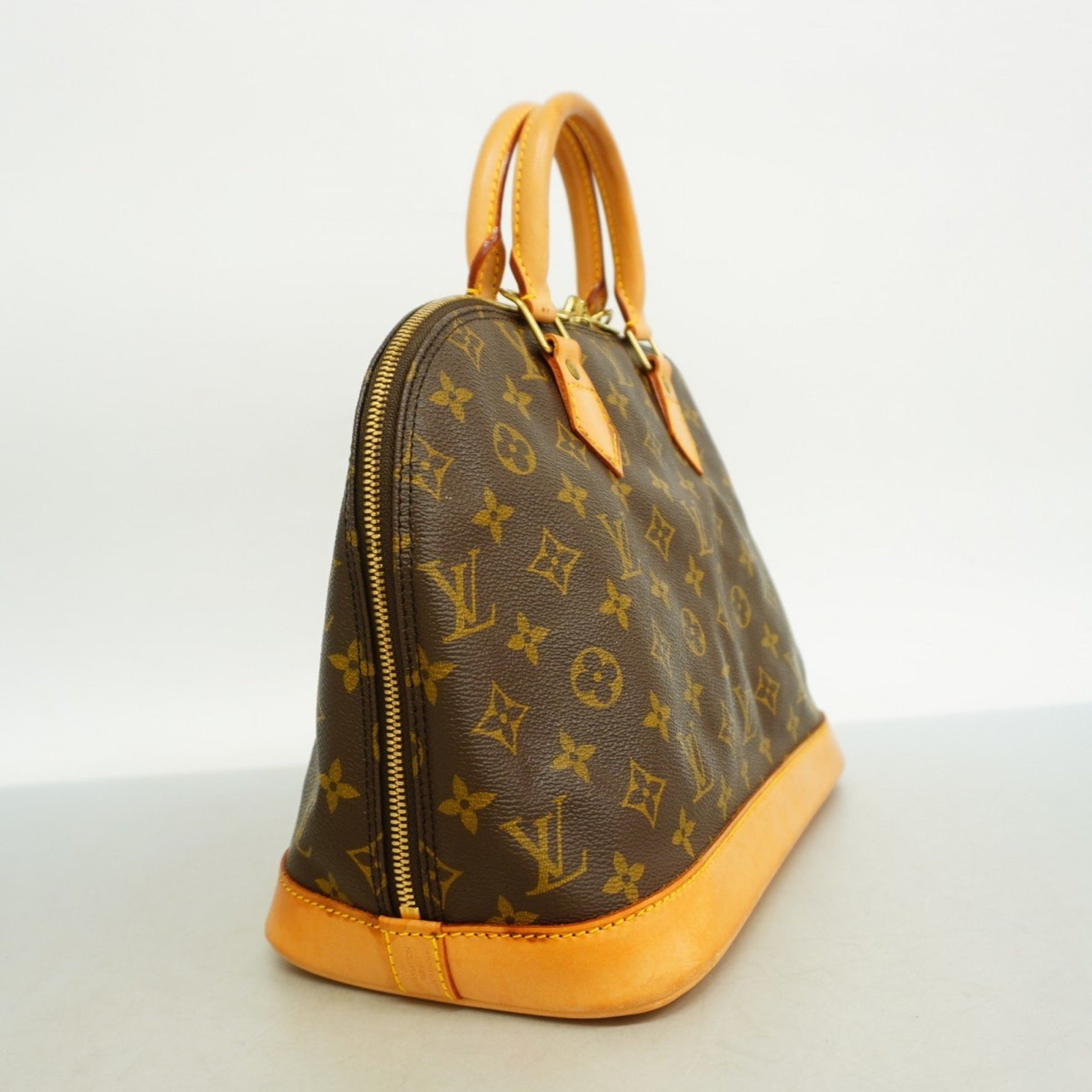 Louis Vuitton Monogram Alma Handbag