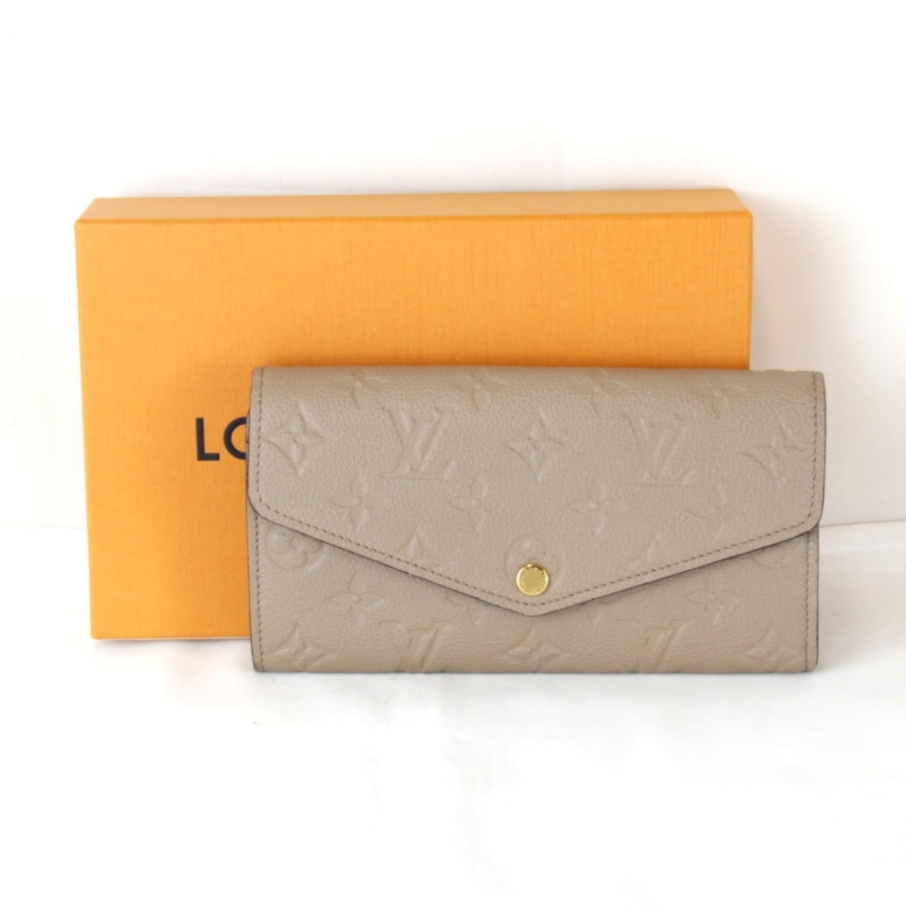 LOUIS VUITTON Monogram Empreinte Portefeuille Sarah Wallet, Leather