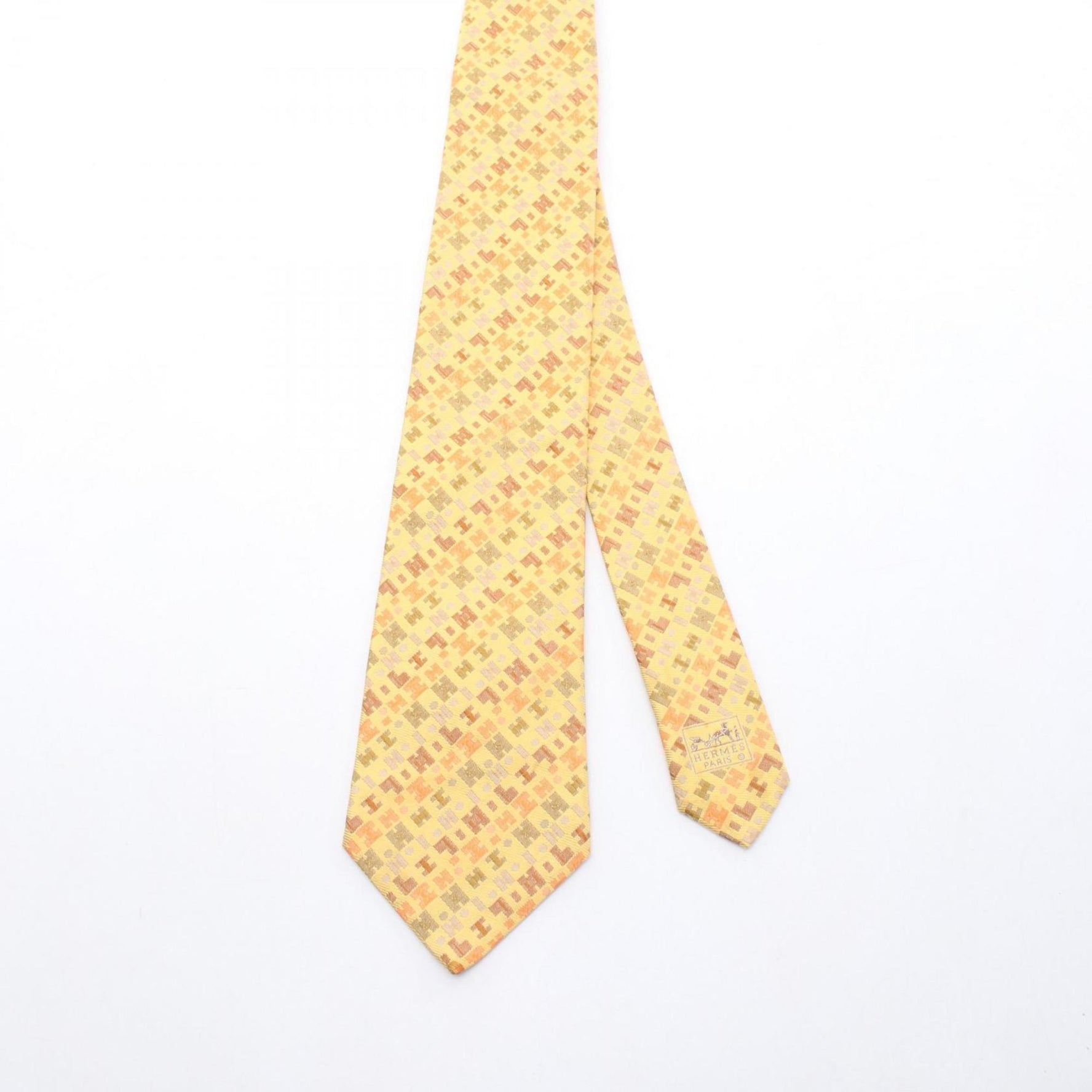Hermes Hermès silk necktie in yellow, orange, and multicolor.