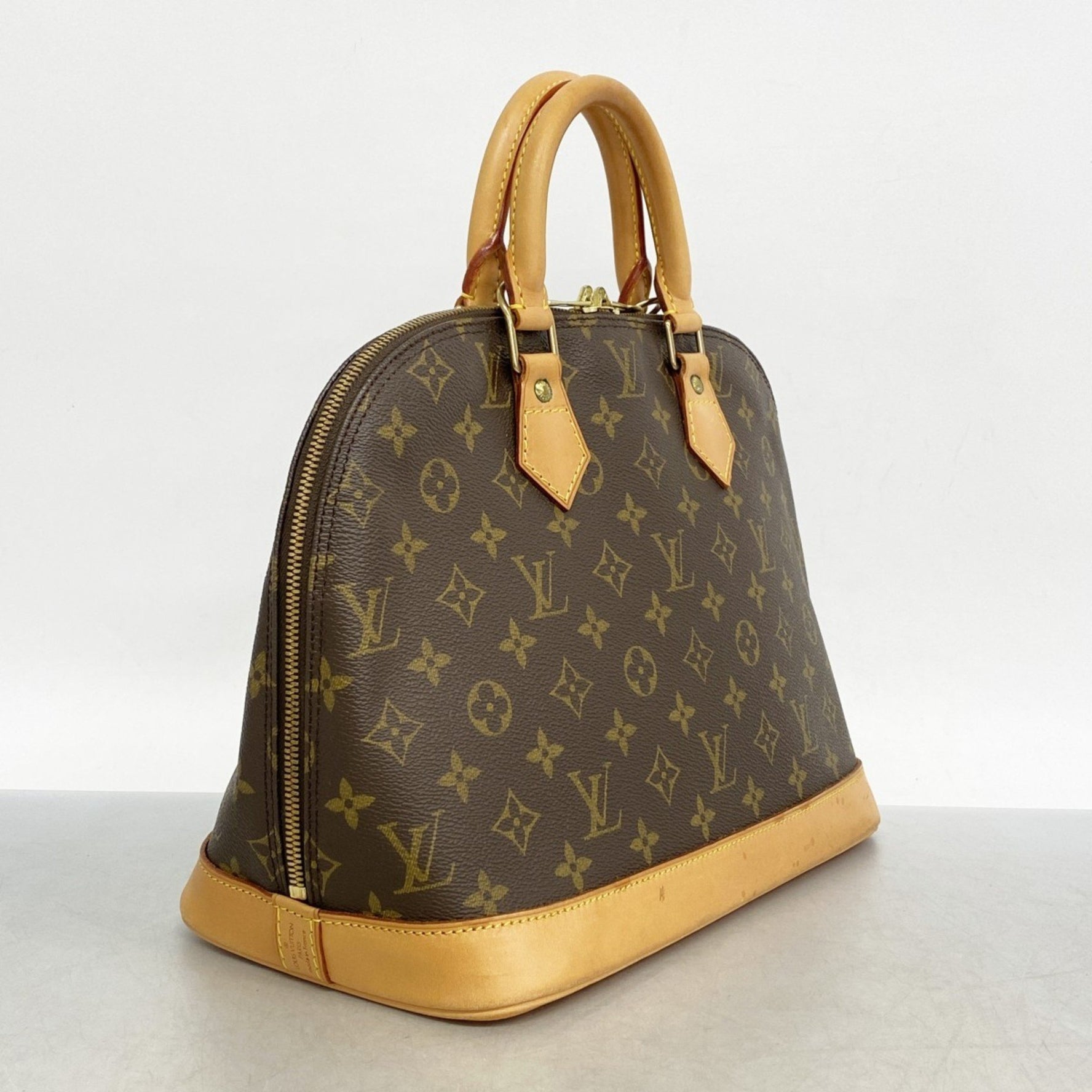Louis Vuitton Monogram Alma Handbag