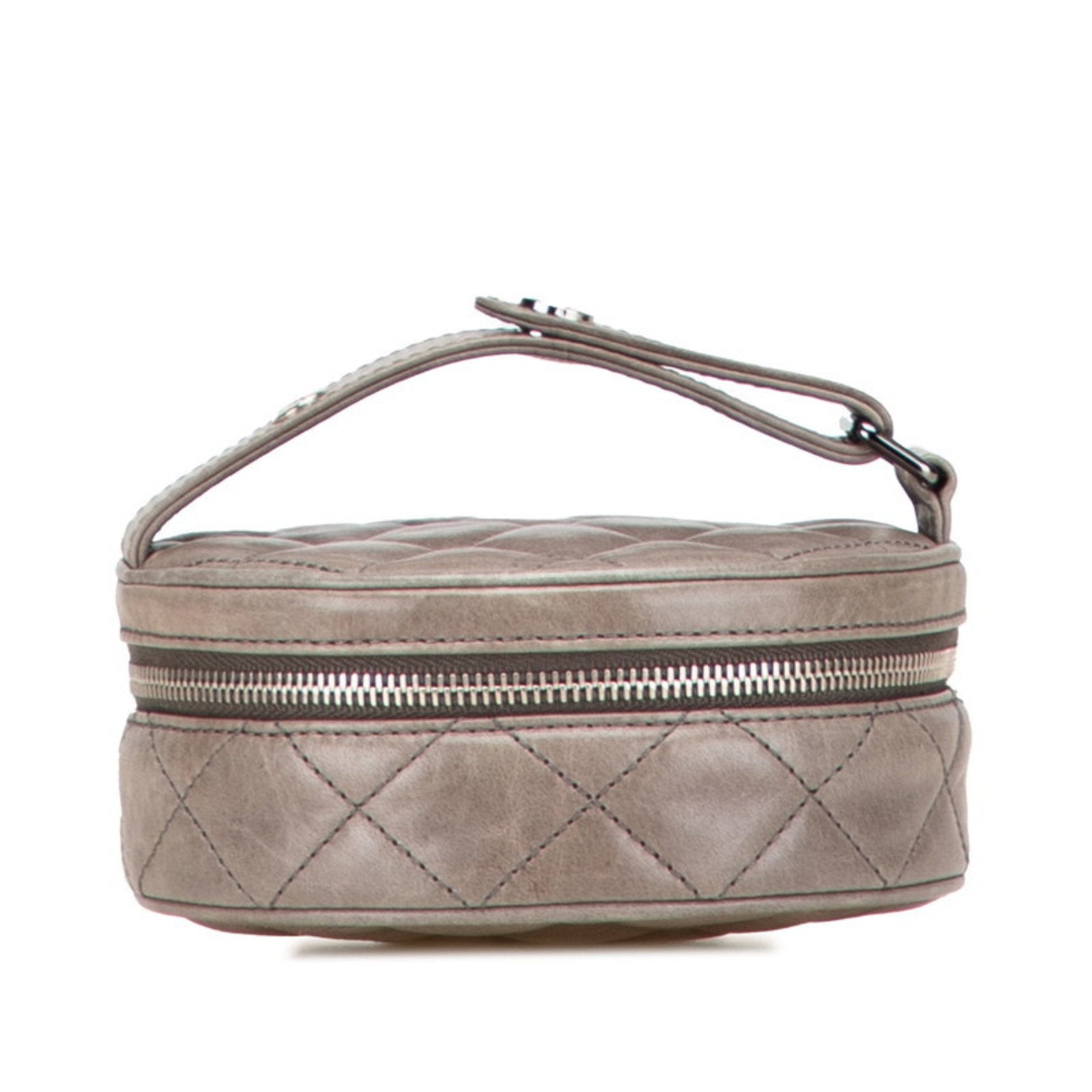 CHANEL Matelasse Coco Mark Round Pouch Vanity Bag in Lambskin