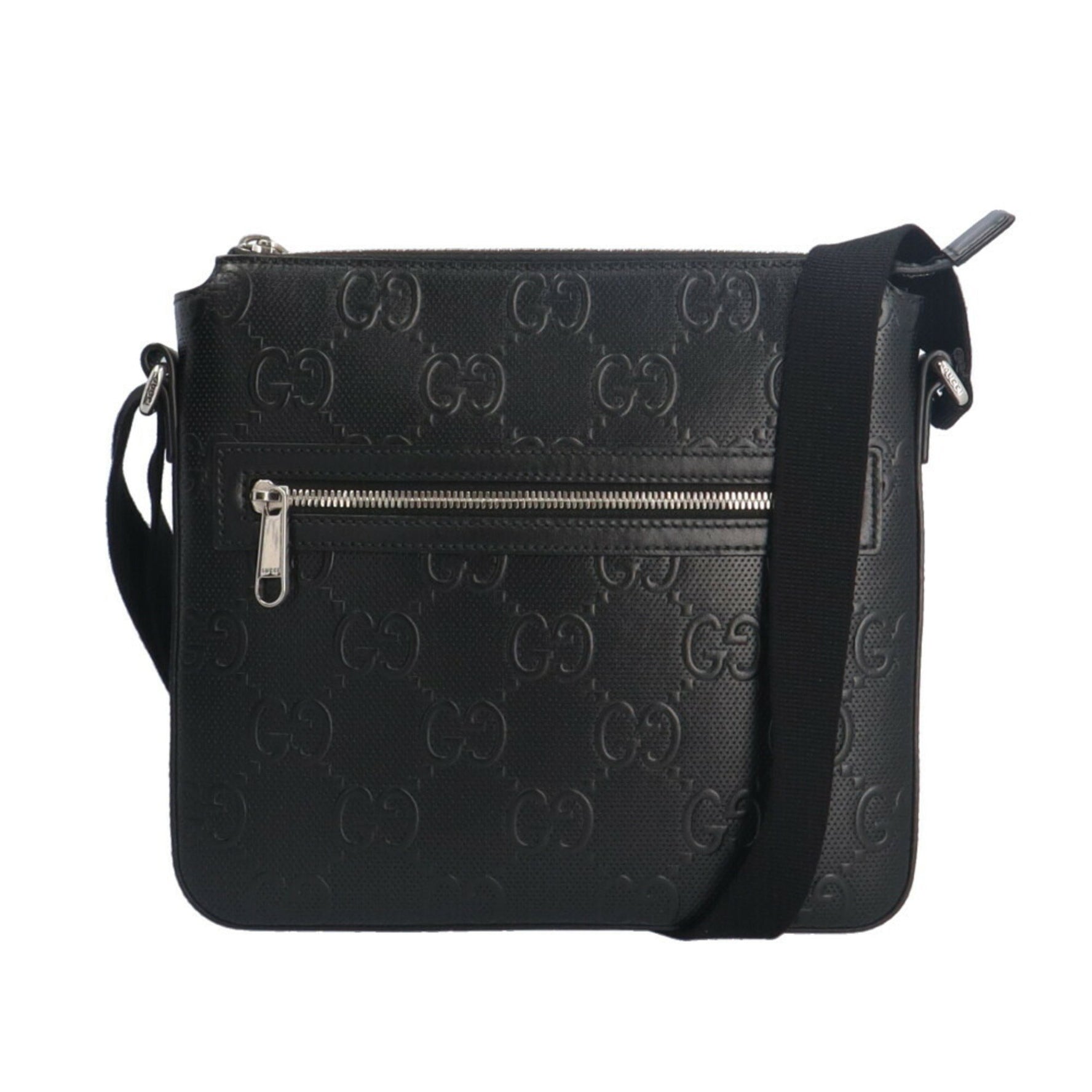 Gucci GG embossed shoulder bag in leather .